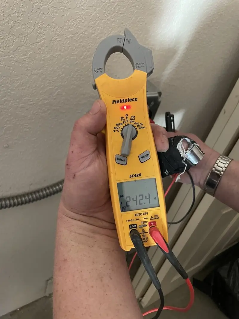 Voltage testing with clamp meter during Generator Installation in Breaux Bridge